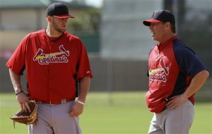 Matt Adams and Jim Edmonds (Photo: AP Photo/Julio Cortez)