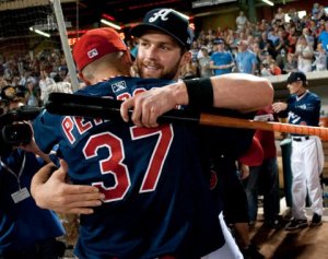 (David Calvert/Calvert Photography) Runner-up Brock Peterson and Home Run Derby winner Matt Davidson congratulate each other.